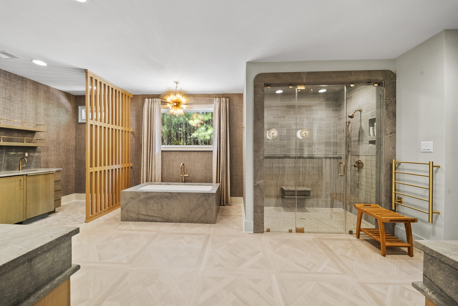 Brookhaven bathroom remodel with freestanding tub and glass shower by Encompass Contracting