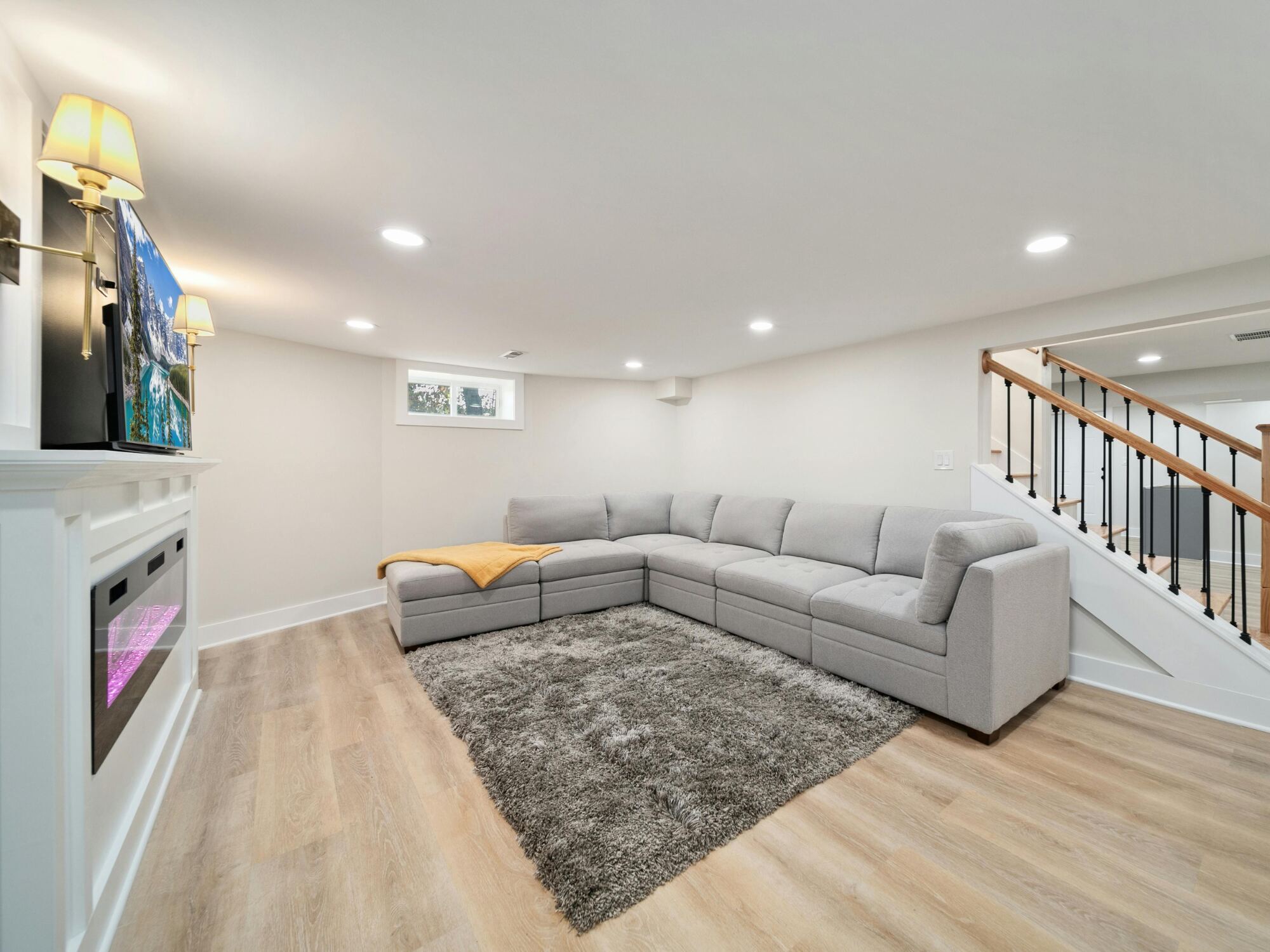 Finished basement remodel in Athens, GA with modern living space and custom design – stock