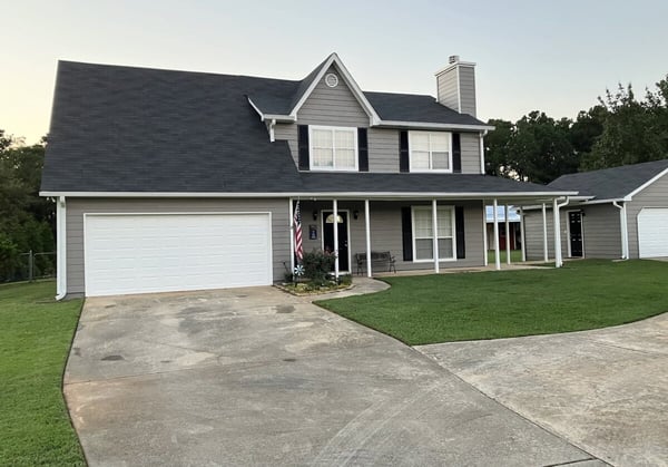 Full exterior home remodel with new siding and roof by Encompass Contracting in Athens, GA
