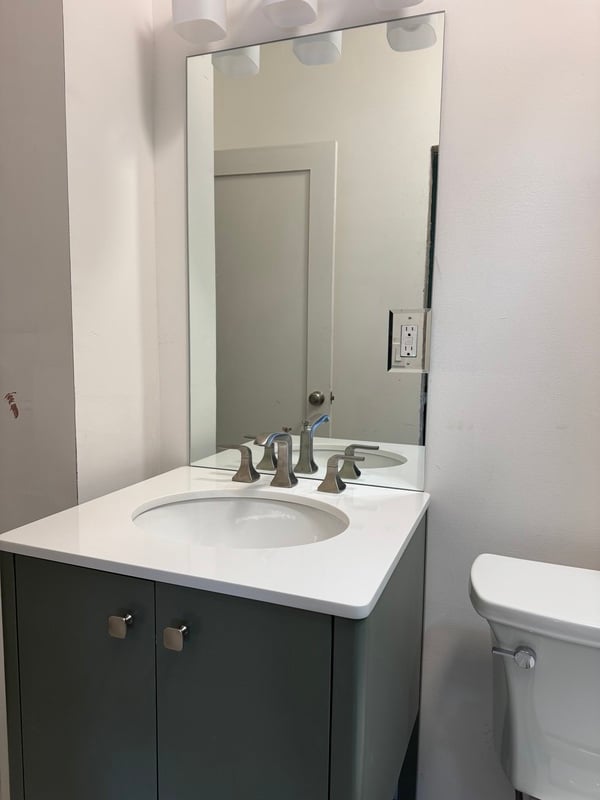 classic bathroom vanity with square mirror in Athens, GA