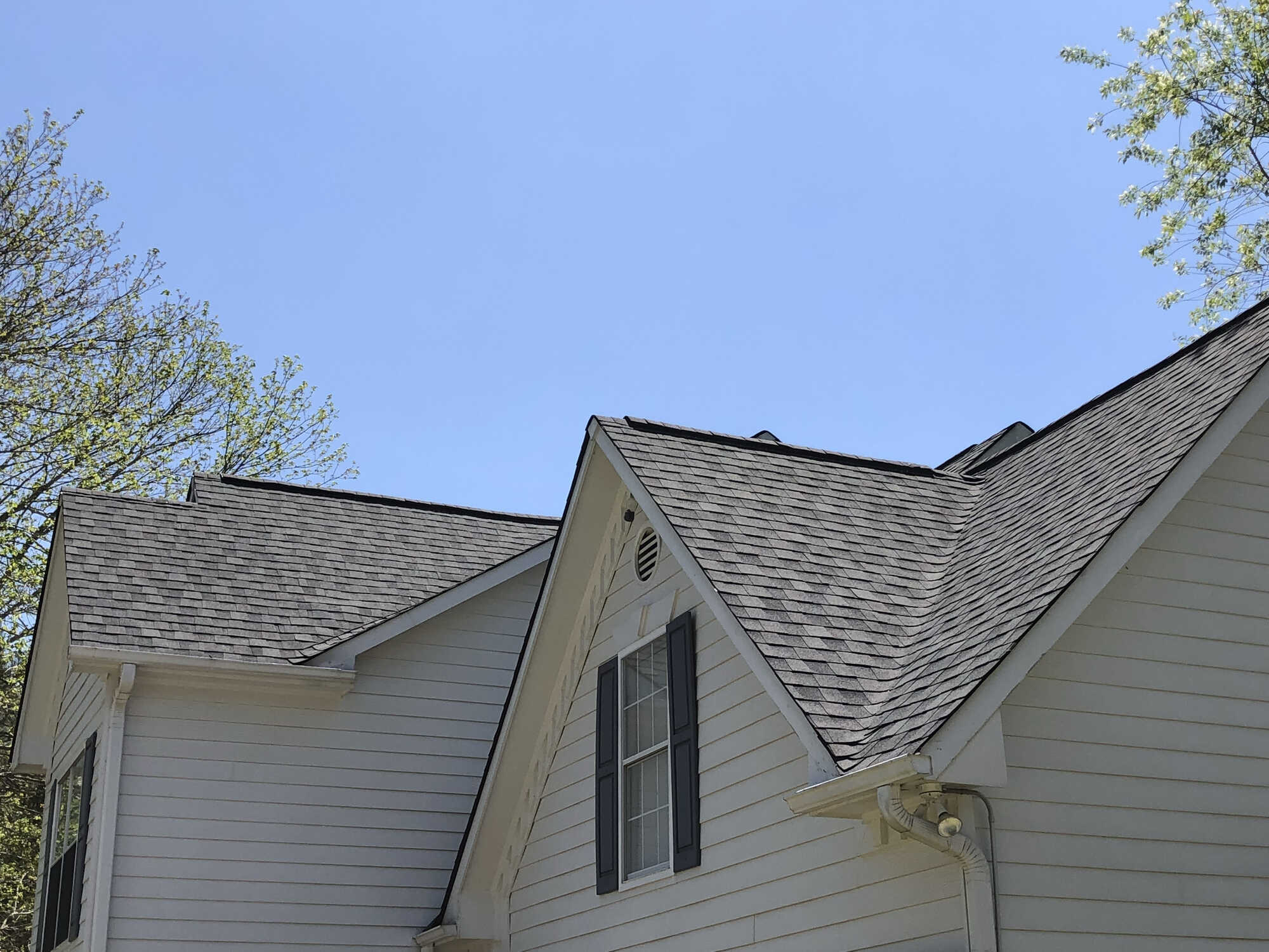 Close-up of new roof shingles installed in Bishop, GA by Encompass Contracting