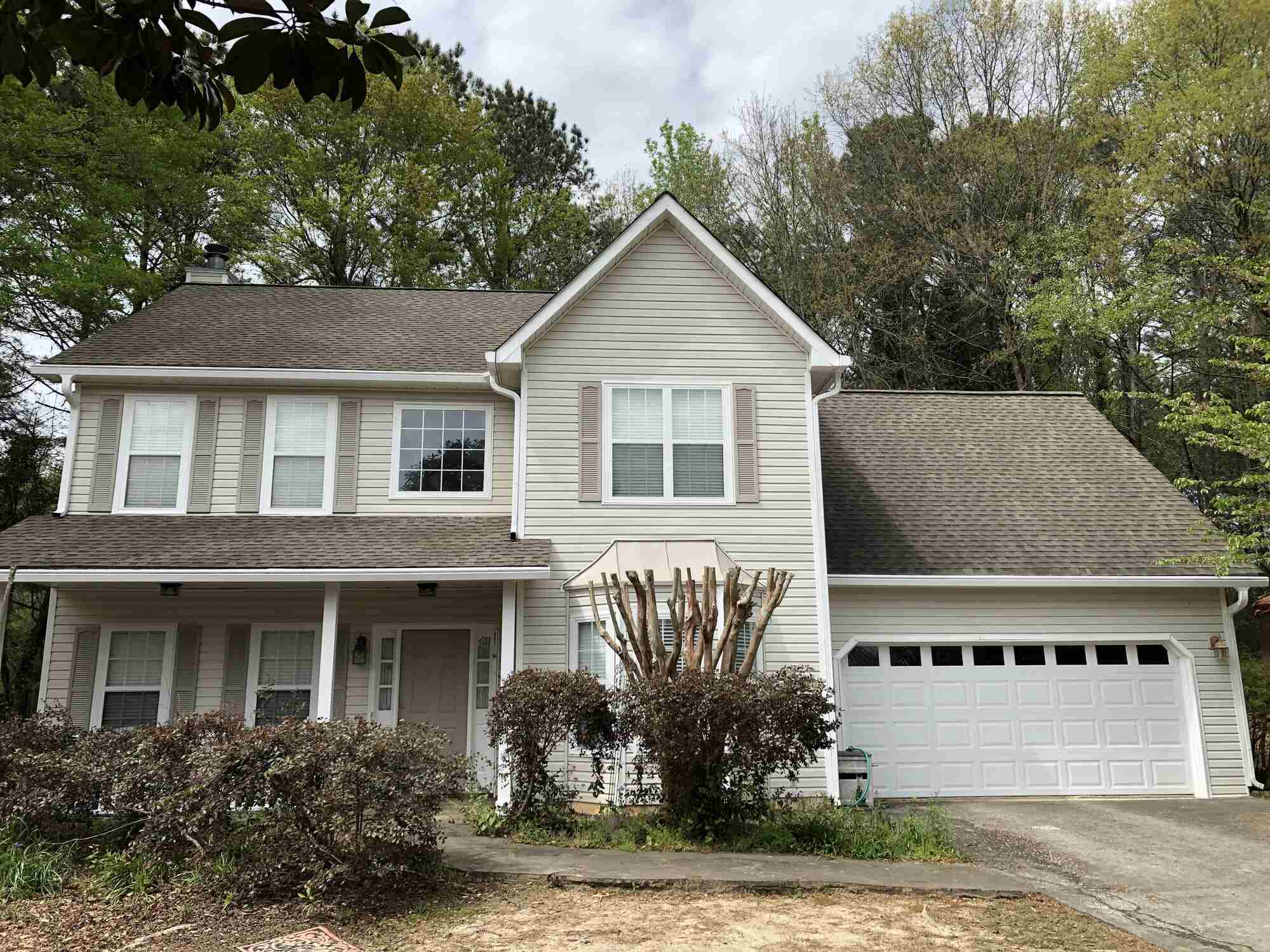 Two-story home roofing replacement in Statham, GA by Encompass Contracting