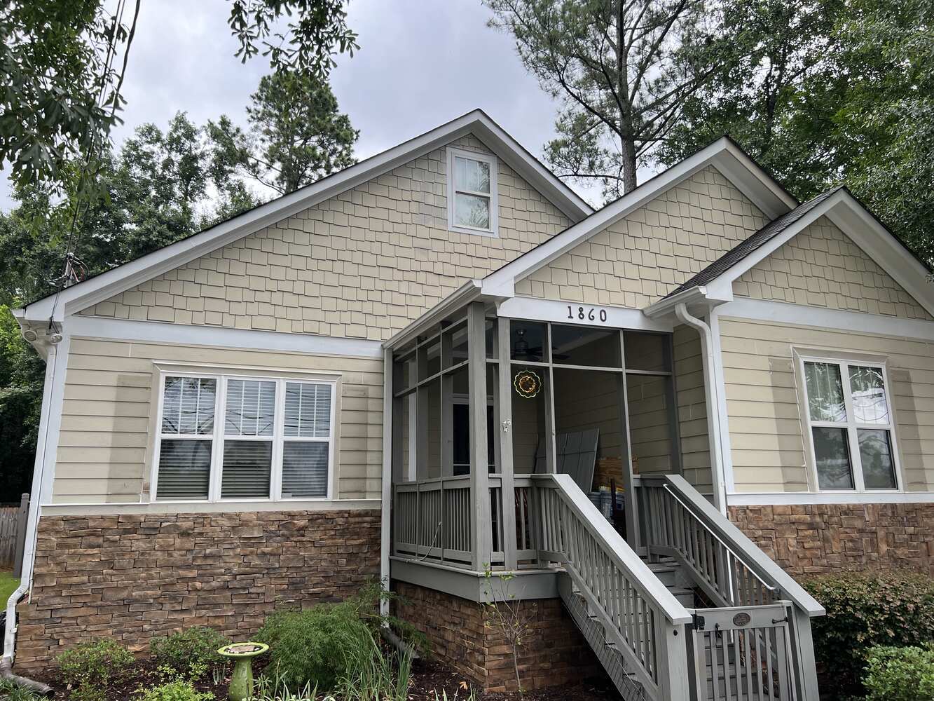 Exterior painting and screened porch repairs by Encompass Contracting in Athens, GA