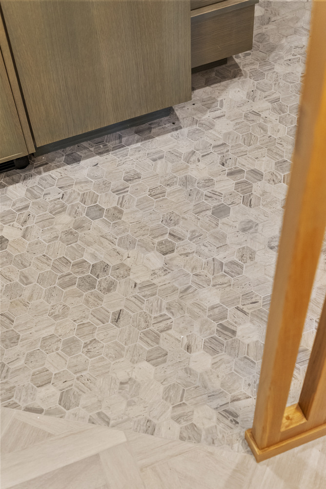 Hexagon tile flooring in Brookhaven bathroom remodel by Encompass Contracting
