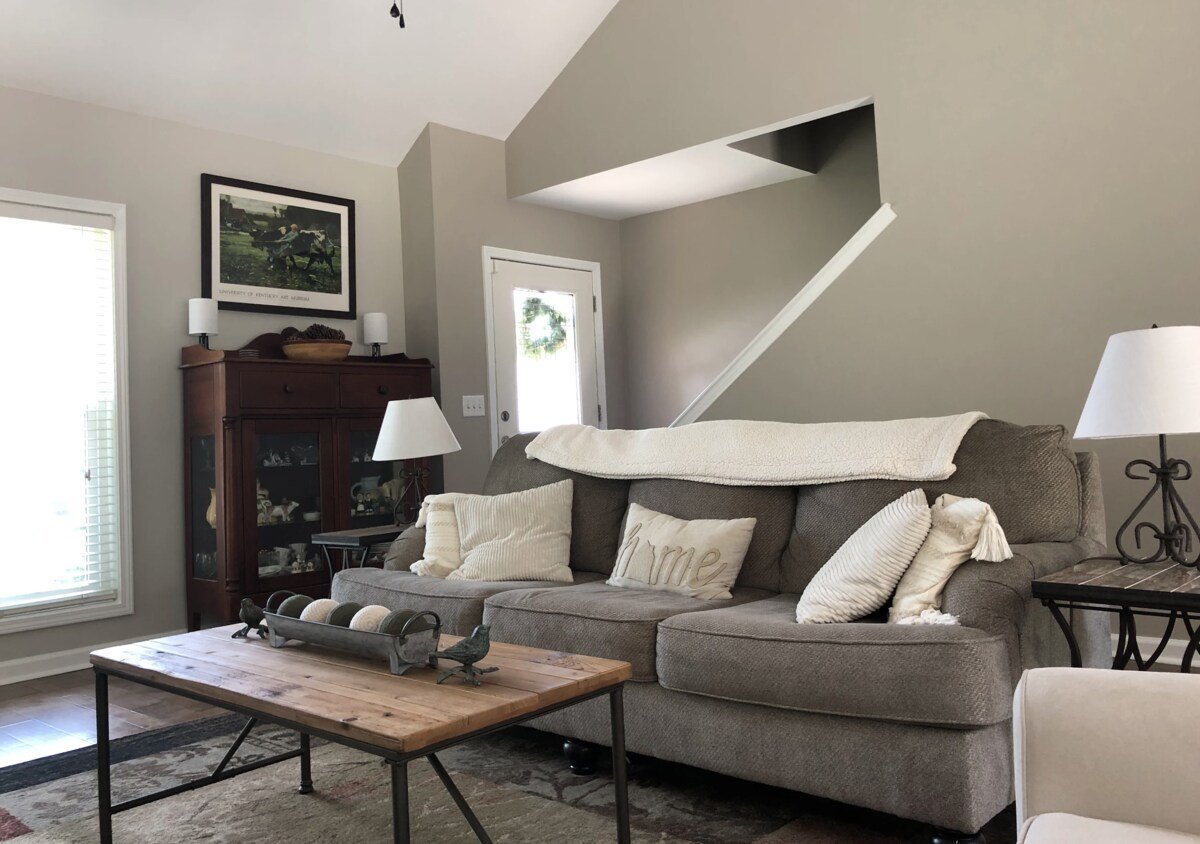 Cozy living room remodel with neutral tones and modern farmhouse decor by Encompass Contracting in Athens, GA
