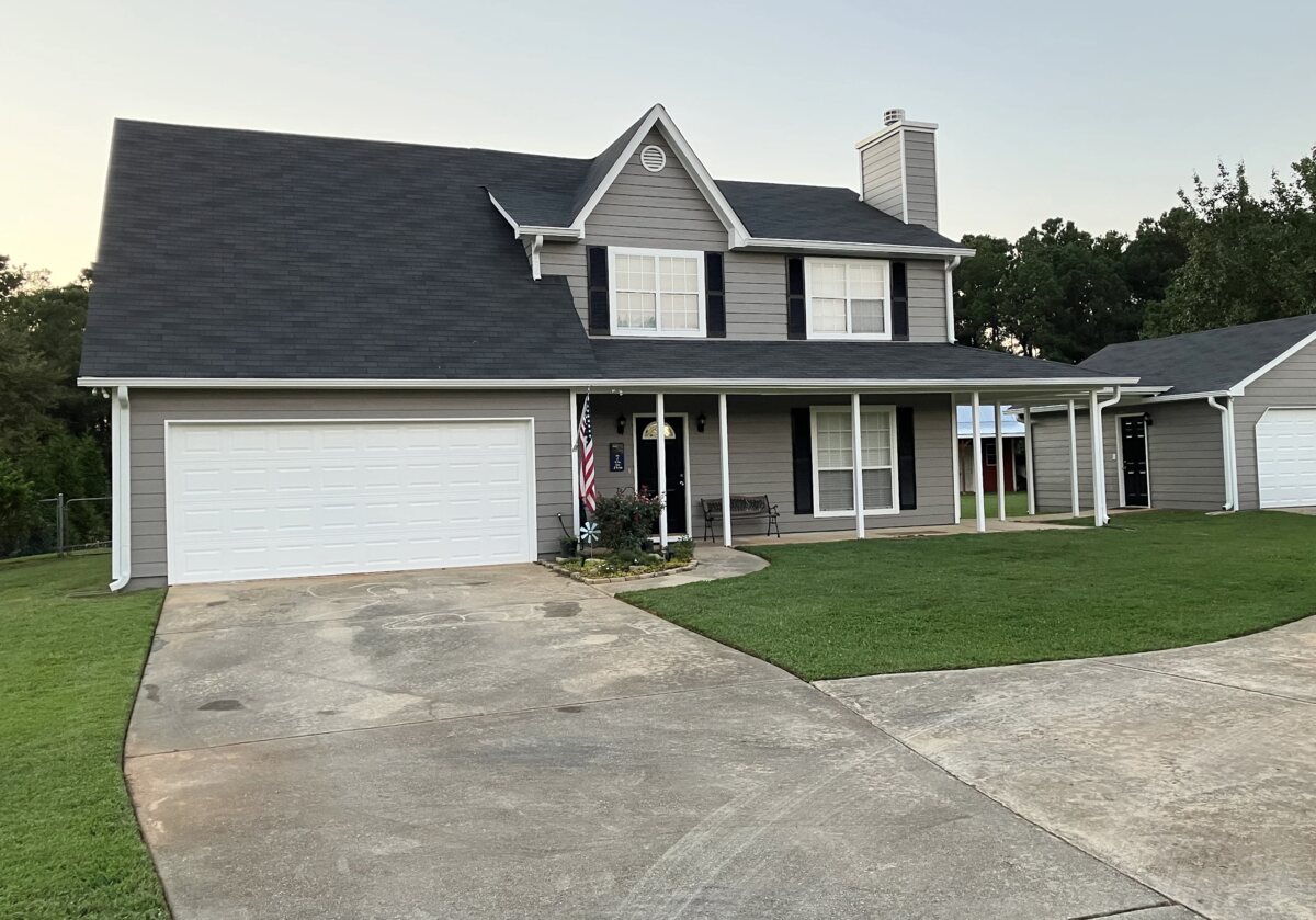 Full exterior home remodel with new siding and roof by Encompass Contracting in Athens, GA