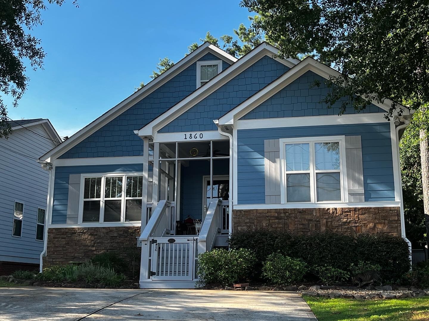 Exterior painting and screened porch repairs by Encompass Contracting in Athens, GA